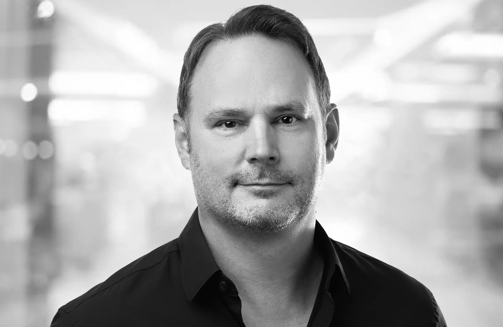 Porträtfoto von Christian Burst, Geschäftsführender Gesellschafter bei 2HM Business Services